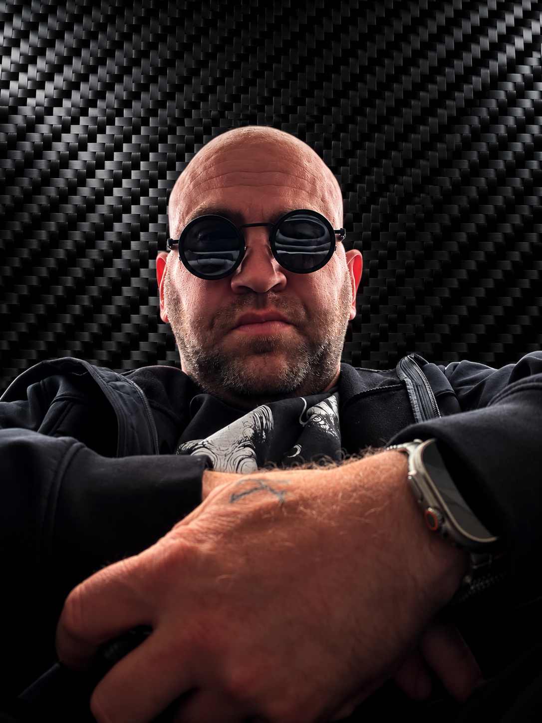 Daniel Welham wearing round dark glasses